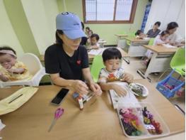 생화로 그린 엄마의 얼굴…성북구, 육아 부모 위한 감성 교육 운영 기사 이미지